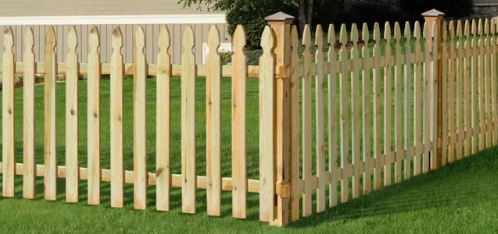 3.5 foot vinyl picket fence in residential yard