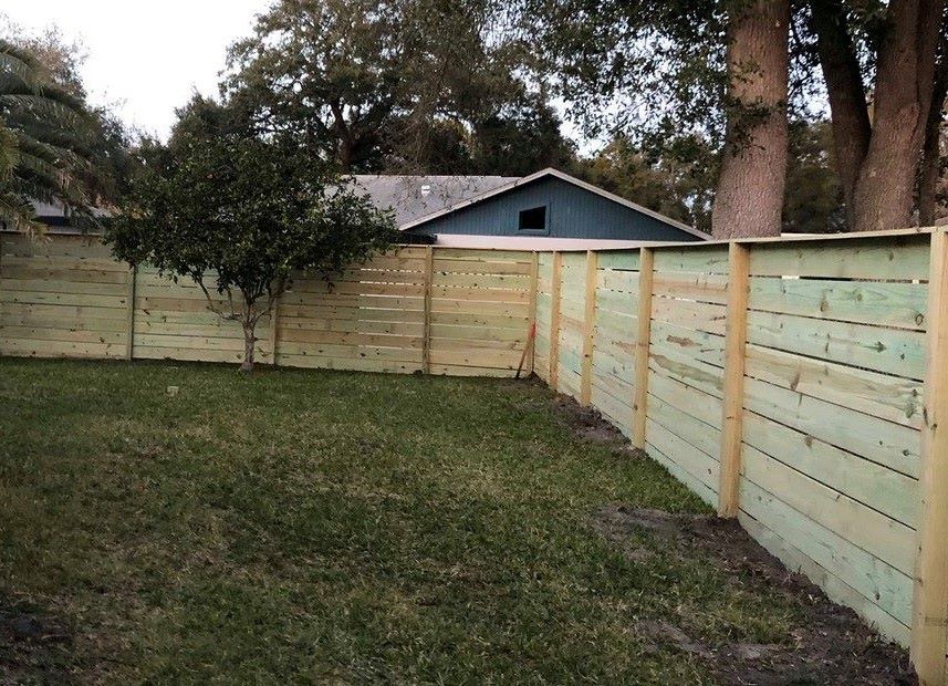 Custom horizontal wood fencing for modern curb appeal